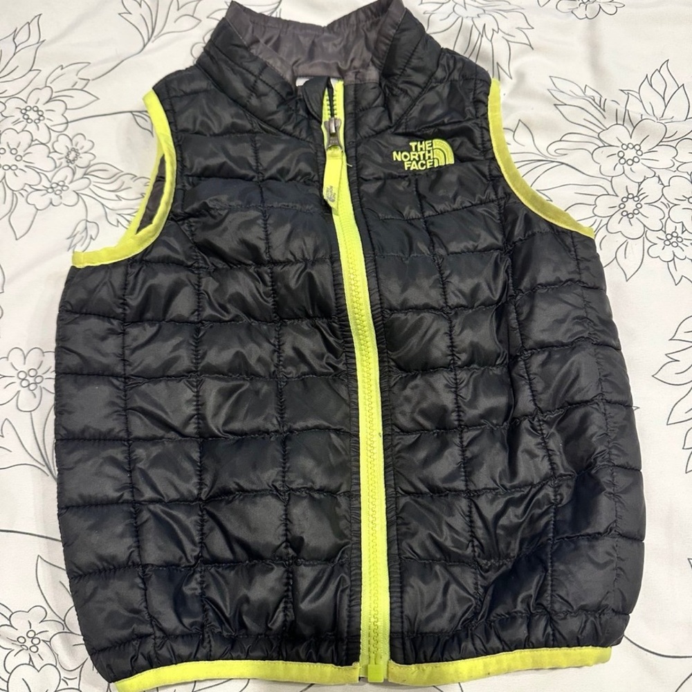 The North Face Black and Yellow Puffer Vest